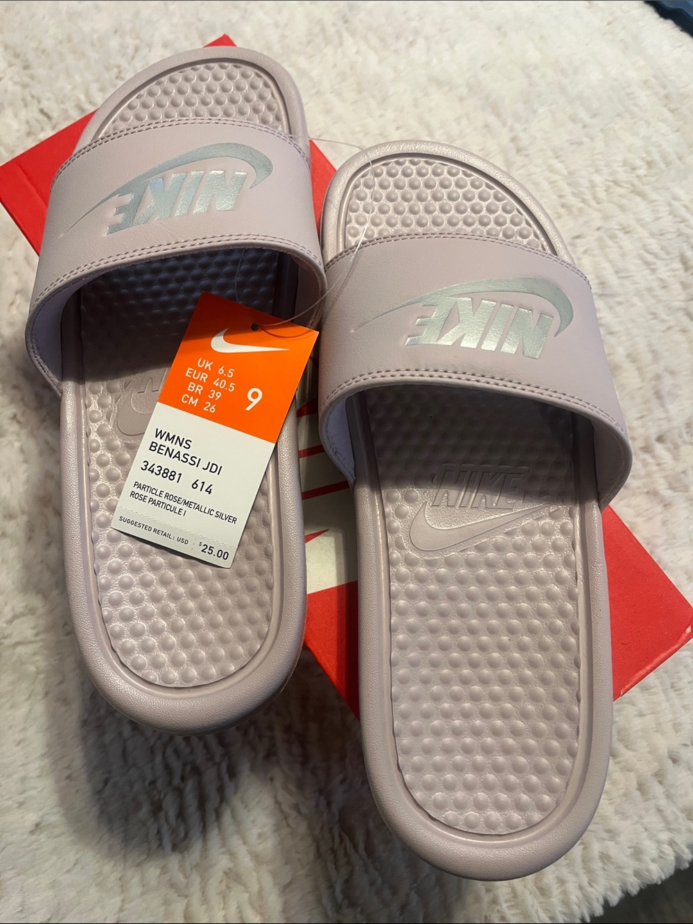 Nike woman Light Pink Slide Sandals with Metallic Silver Logo